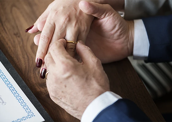 private-investigator-56 Two hands in a marriage ceremony